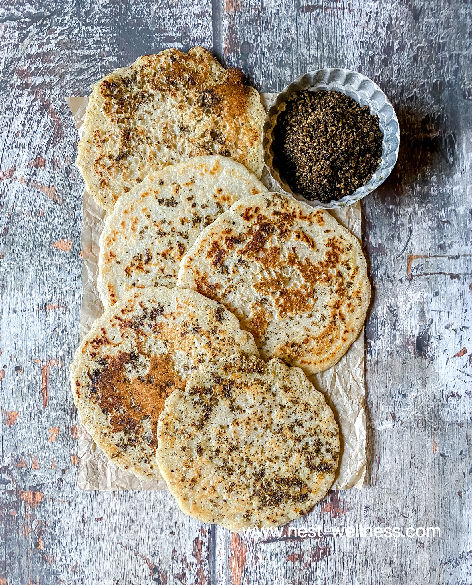 paleo flatbread and a cup of zaatar spice