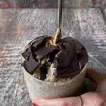 glass jar of peanut butter No Oats with hard dark chocolate magic shell