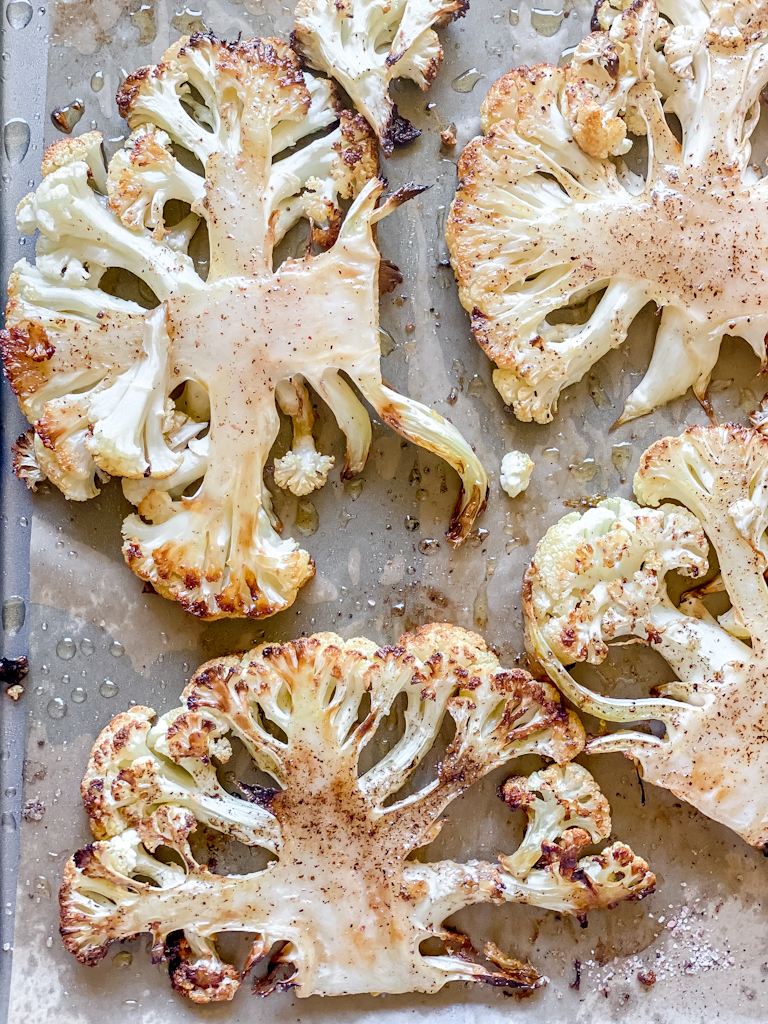 close up of roasted cauliflower steaks, nicely browned