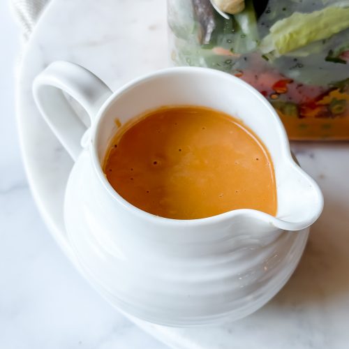 small pitcher of dressing