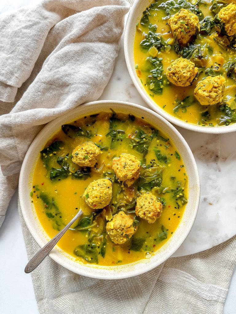 2 bowls of lemon, turmeric, feta meatball soup