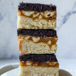 stack of three chocolate caramel shortbread bars