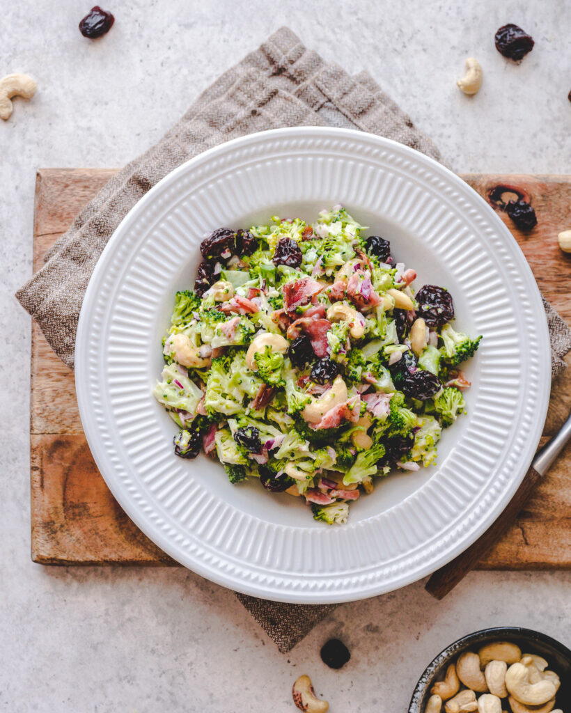 bowl filled with a nutritious and sugar free, low carb broccoli salad