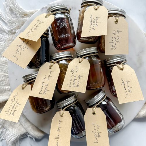 Nest Wellness homemade sugar free coffee syrups in cute glass jars