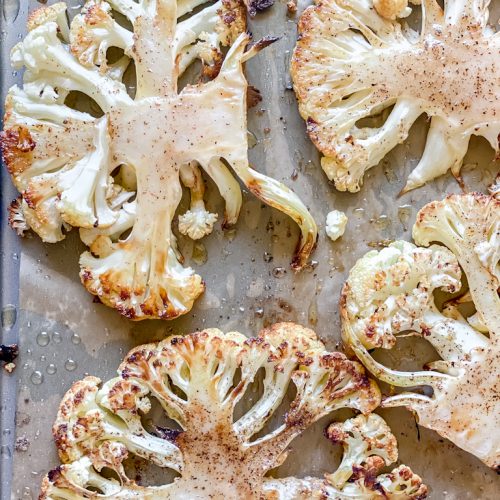 close up of roasted cauliflower steaks, nicely browned