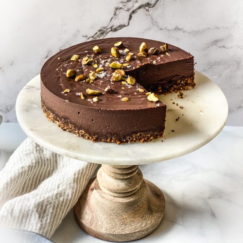 chocolate torte topped with pistachios and coarse sea salt