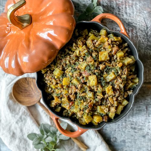 staub pumpkin cocotte filled with paleo stuffing