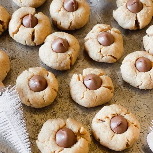 photo of Peanut Butter Blossom cookies with chocolate center