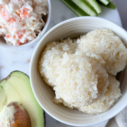 close up of a bowl of cauliflower sushi rice