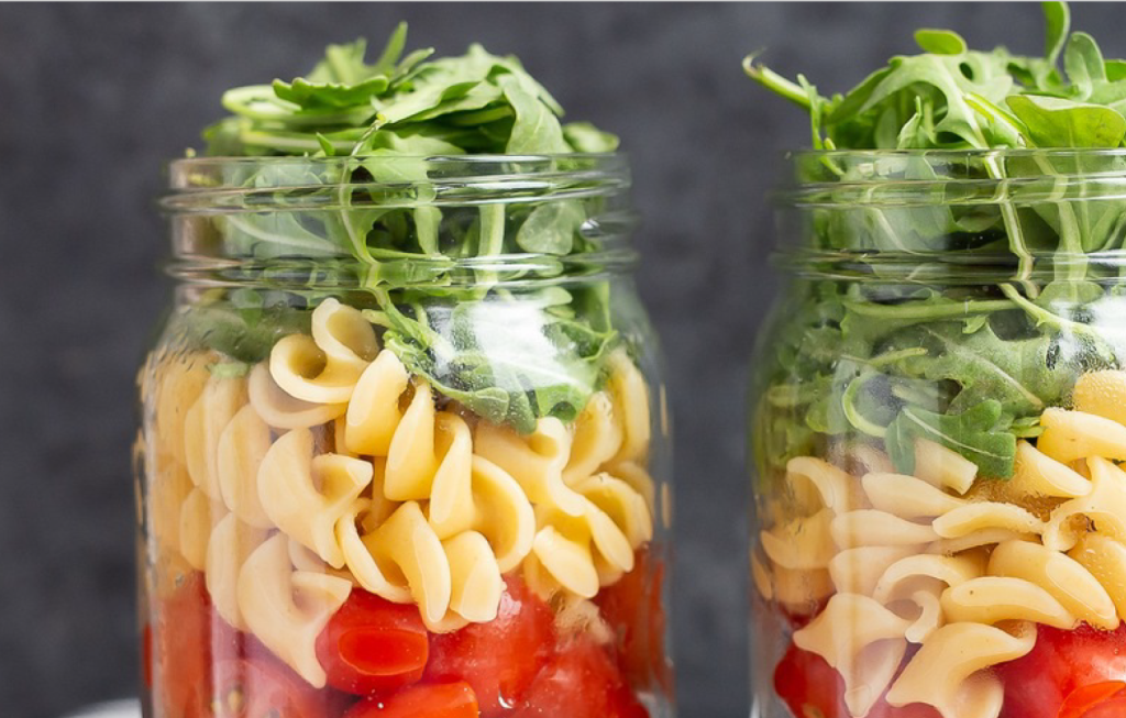 close up photo of mason jar lupin pasta salad