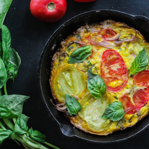 cover of 30 grams of protein ebook featuring tomato bacon frittata